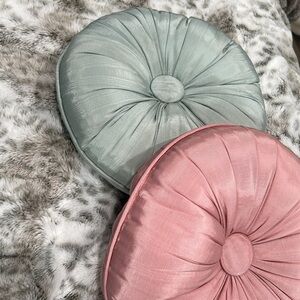 (2) vintage round pillows